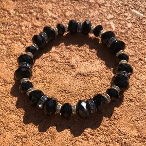 Black crystal  bracelet with gunmetal roundelles